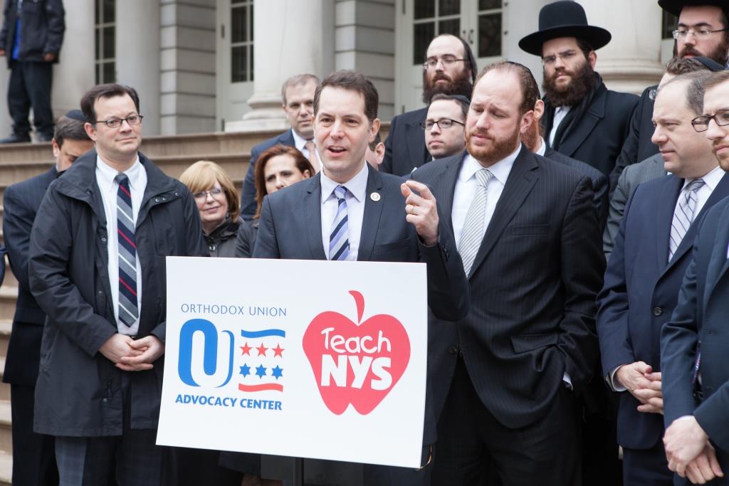 Council Member Mark Levine (speaking), chairman of the City Council’s Jewish caucus, stood alongside Council Members Andrew Cohen, David Greenfield and Rory Lancman, calling for UPK legislation to include non-public schools and be “truly universal” at Wednesday’s OU Advocacy-Teach NYS press conference at City Hall.