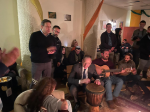 US Ambassador to Israel Tom Nides plays drums during drop-in visit at OU Israel Center