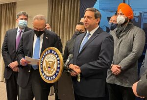 The OU's Nathan Diament speaks alongside Senate Majority Leader Chuck Schumer at press conference in NY Jan. 26, 2022 calling for Nonprofit Security Grant Funding increase to $360 million